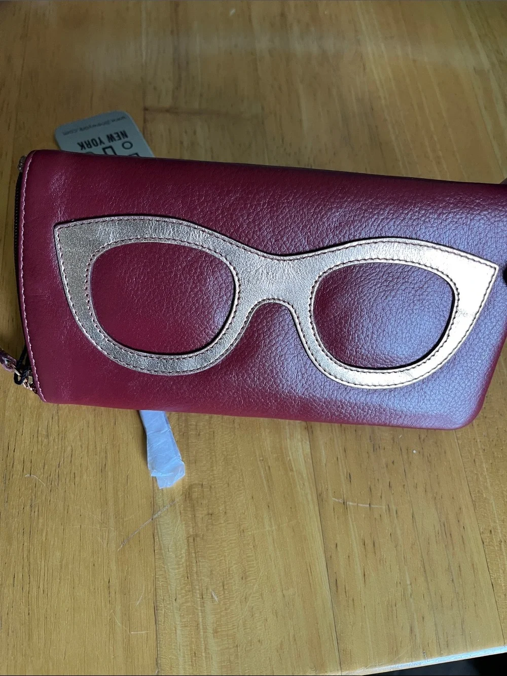 ili New York eyeglass case with frame graphic in Merlot and metallic rose